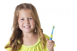 cute-little-girl-brushing-her-teeth-000032505048_double